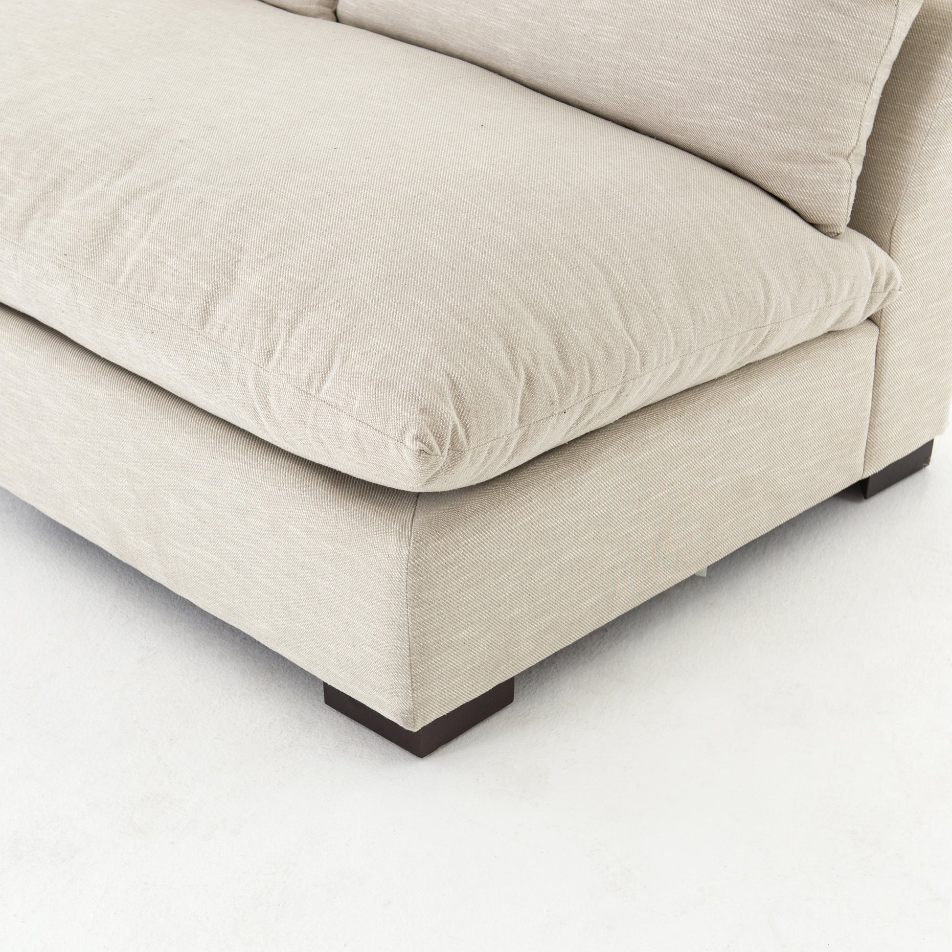 The upholstery of this Grant Armless Piece - Oatmeal is soft, durable, and stain-resistance, making it the perfect choice for families or those who love to cuddle with their furry friends.   Overall Dimensions: 72.00"w x 40.00"d x 31.50"h