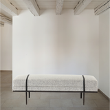 Make a chic statement with the Harris Knoll Domino Accent Bench. Decorative straps of black top-grain leather take chaise-style bench seating to the next level. Airy, elongated legs lend a look of lightness for balance.  Overall Dimensions: 60"w x 26"d x 19.25"h