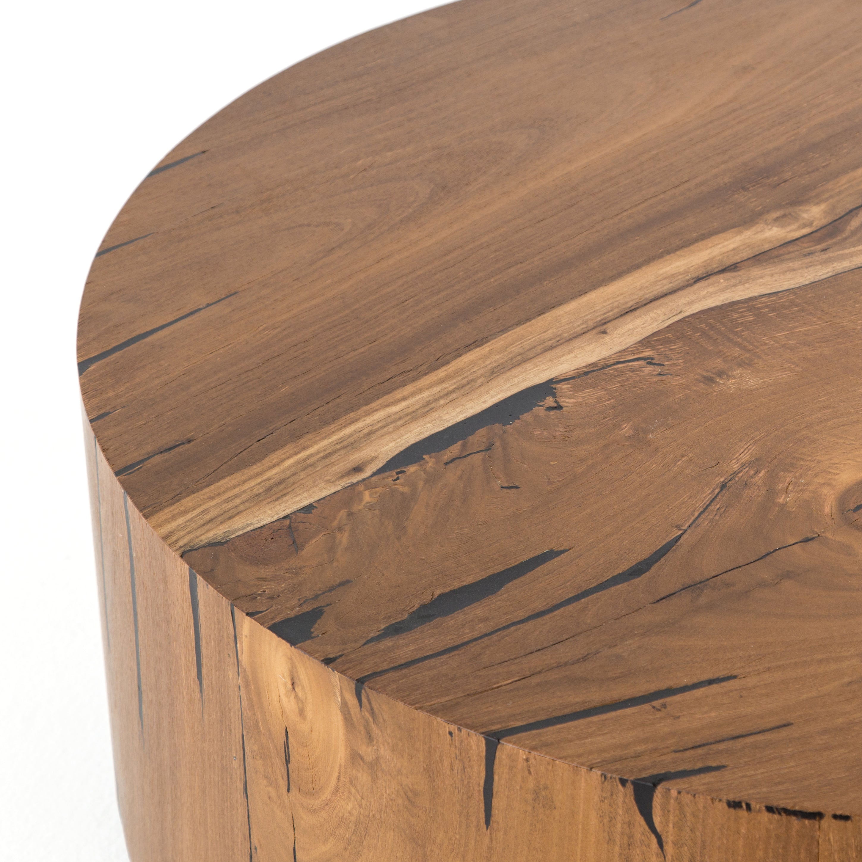 Featuring Hudson Coffee Table - Natural Yukas by Four Hands at Amethyst Home. We love how the stunning forces of nature are captured in the Hudson Natural Yukas Coffee Table. Natural yukas wood is hand-shaped into a cylindrical silhouette and placed over a bronzed iron base to complete your living room space. 
Overall Dimensions: 40"W x 40"L x 15"H
Colors: Bl.  Amethyst Home provides interior design, new home construction design consulting, vintage area rugs, and lighting in the Austin metro area.