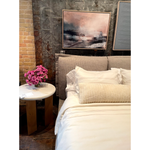 We love the plush look of this Inwood Bed. The oversized pillow-like cushioning creates the headboard for this low-profile bed, for a grand-but-cozy look in any bedroom.   Queen Overall Dimensions: 74.75"w x 95.25"d x 43.50"h King Overall Dimensions: 91.00"w x 95.25"d x 43.50"h