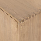 This Isador Nightstand - Dry Wash Poplar is clean, bright and dreamy. Solid dry-washed poplar forms a clean-lined media console with dovetail joinery plus iron and leather hardware, for a fresh look to any living room.  Ample shelving + rear cut outs for cord management brings this to the next level!  Overall Dimensions: 80.00"w x 19.00"d x 26.00"h
