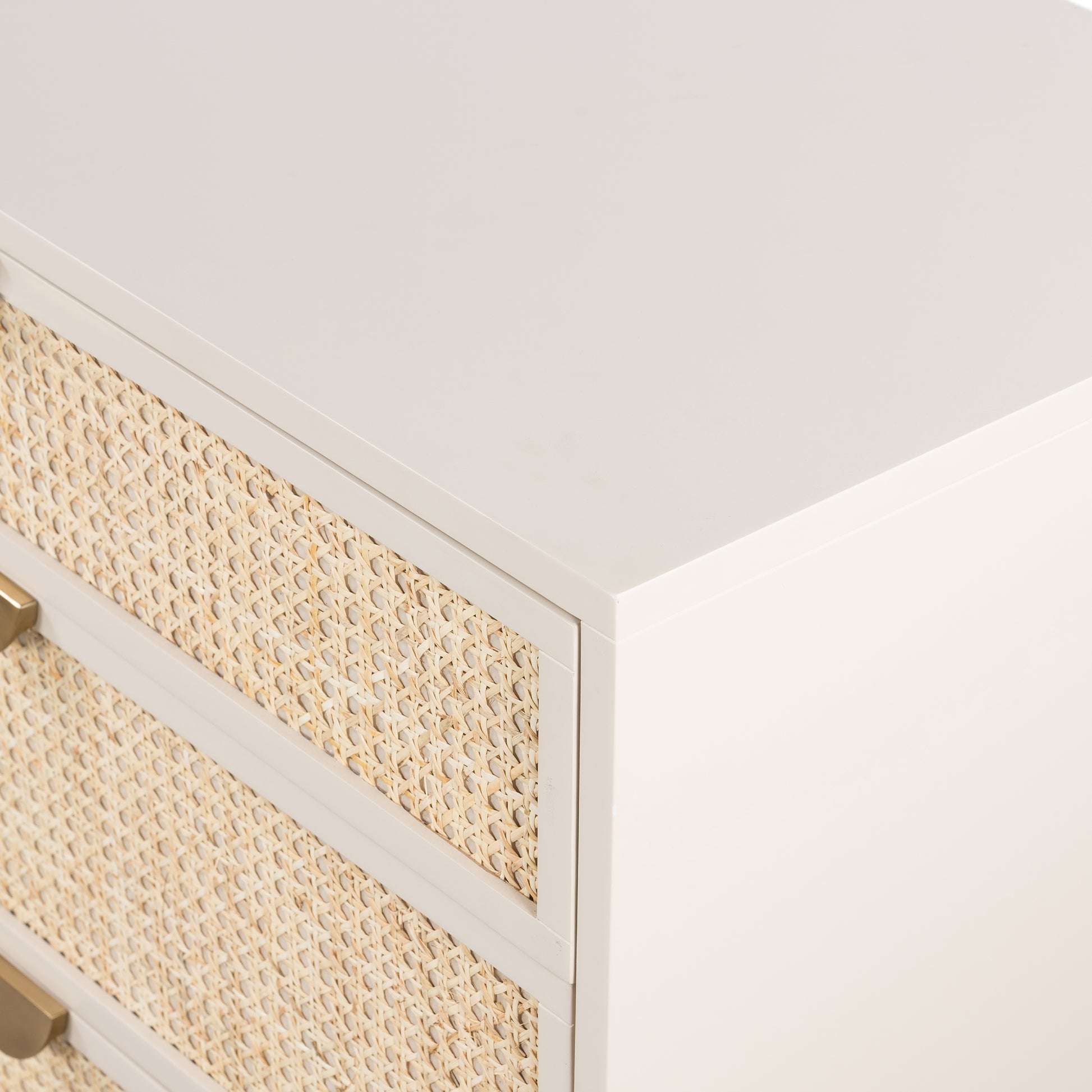 Bring a light look to bedroom styling with this Luella 6 Drawer Dresser - Matte Alabaster. A lacquered six-drawer dresser features woven cane panels and half-moon hardware finished in an aged brass for a beautiful + functional dresser in any bedroom!  Overall Dimensions: 64.00"w x 19.00"d x 33.50"h