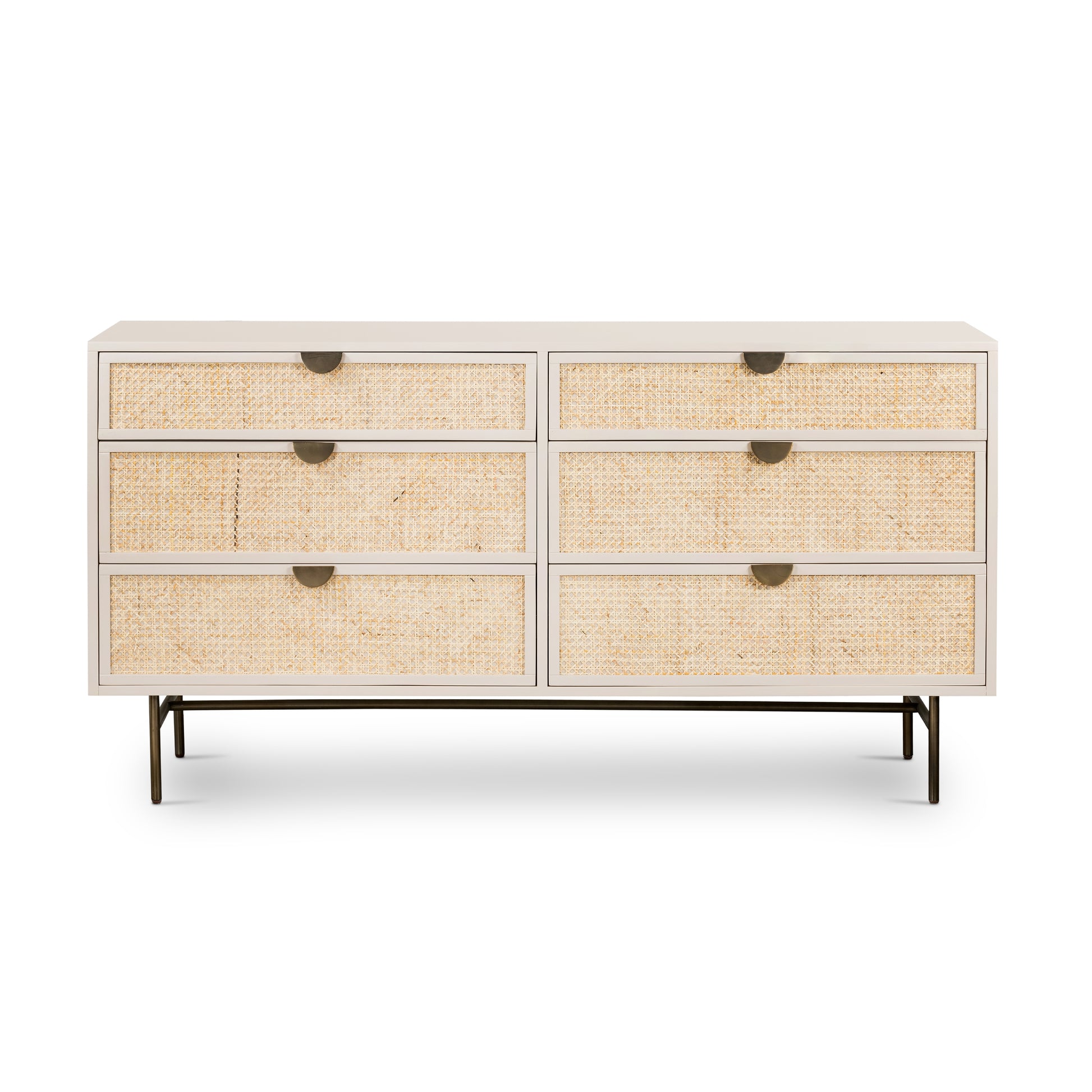 Bring a light look to bedroom styling with this Luella 6 Drawer Dresser - Matte Alabaster. A lacquered six-drawer dresser features woven cane panels and half-moon hardware finished in an aged brass for a beautiful + functional dresser in any bedroom!  Overall Dimensions: 64.00"w x 19.00"d x 33.50"h