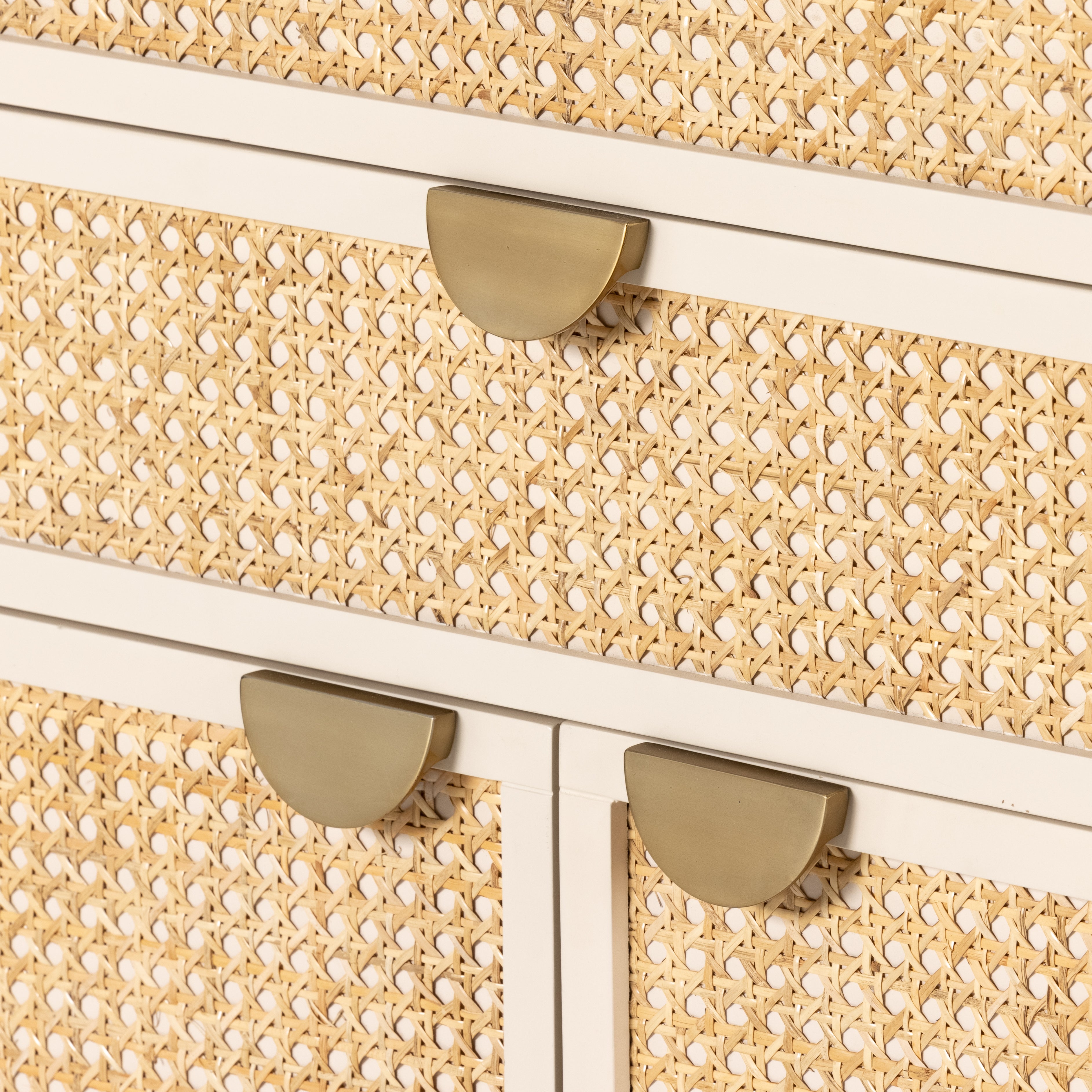 Featuring Luella Tall Dresser - Matte Alabaster by Four Hands at Amethyst Home. Bring a light look to bedroom styling with this Luella Tall Dresser - Matte Alabaster. A tall, lacquered dresser features woven cane panels and half-moon hardware finished in an aged brass. Four drawers plus cabinetry with interior shelving for generous storage space for any bedr.  Amethyst Home provides interior design, new home construction design consulting, vintage area rugs, and lighting in the Seattle metro area.