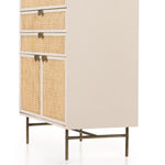 Featuring Luella Tall Dresser - Matte Alabaster by Four Hands at Amethyst Home. Bring a light look to bedroom styling with this Luella Tall Dresser - Matte Alabaster. A tall, lacquered dresser features woven cane panels and half-moon hardware finished in an aged brass. Four drawers plus cabinetry with interior shelving for generous storage space for a.  Amethyst Home provides interior design, new home construction design consulting, vintage area rugs, and lighting in the Salt Lake City metro area.