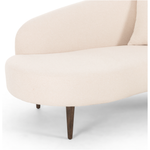 This curvy, Italian-inspired Luna Chaise exudes attitude. This features exclusive performance-grade ivory boucle in a striking, sultry S shape. Dual pillows for a fine finishing touch for any bedroom, office, or living room.  Overall Dimensions: 70.00"w x 35.00"d x 30.00"h