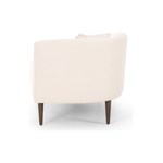 This curvy, Italian-inspired Luna Chaise exudes attitude. This features exclusive performance-grade ivory boucle in a striking, sultry S shape. Dual pillows for a fine finishing touch for any bedroom, office, or living room.  Overall Dimensions: 70.00"w x 35.00"d x 30.00"h