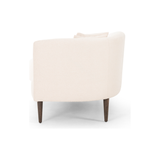 This curvy, Italian-inspired Luna Chaise exudes attitude. This features exclusive performance-grade ivory boucle in a striking, sultry S shape. Dual pillows for a fine finishing touch for any bedroom, office, or living room.  Overall Dimensions: 70.00"w x 35.00"d x 30.00"h