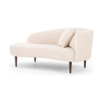 This curvy, Italian-inspired Luna Chaise exudes attitude. This features exclusive performance-grade ivory boucle in a striking, sultry S shape. Dual pillows for a fine finishing touch for any bedroom, office, or living room.  Overall Dimensions: 70.00"w x 35.00"d x 30.00"h