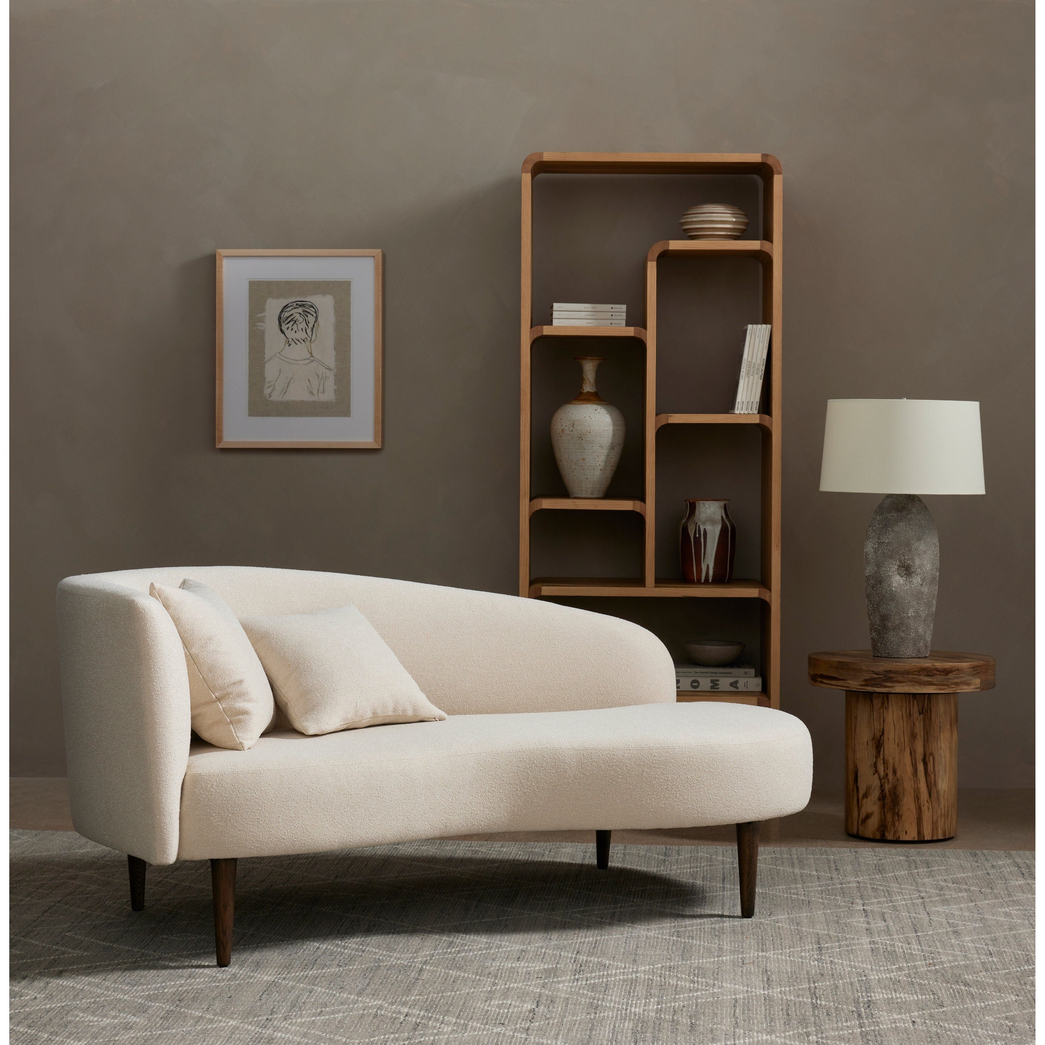 This curvy, Italian-inspired Luna Chaise exudes attitude. This features exclusive performance-grade ivory boucle in a striking, sultry S shape. Dual pillows for a fine finishing touch for any bedroom, office, or living room.  Overall Dimensions: 70.00"w x 35.00"d x 30.00"h