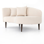 This curvy, Italian-inspired Luna Chaise exudes attitude. This features exclusive performance-grade ivory boucle in a striking, sultry S shape. Dual pillows for a fine finishing touch for any bedroom, office, or living room.  Overall Dimensions: 70.00"w x 35.00"d x 30.00"h