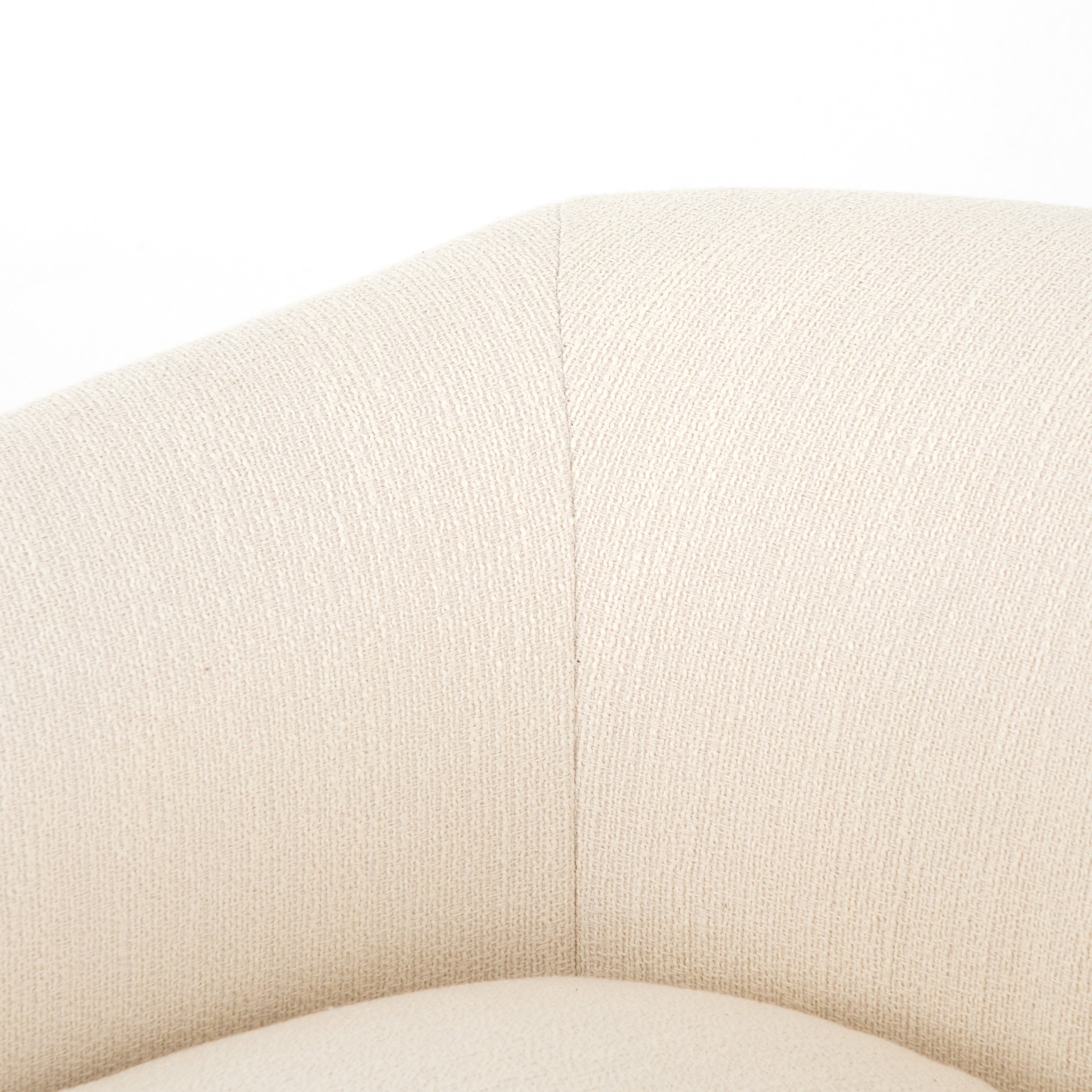 A fresh take on the traditional tub chair, this Lyla Chair - Kerbey Ivory has an exaggerated depth for drama and comfort. Solid rubberwood legs intersect ivory upholstery for clean contrast of color and scale. A comfy, gorgeous chair to add to any living room, office, or other space.   Overall Dimensions: 38.00"w x 33.00"d x 28.00"h