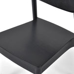 Featuring Maddie Dining Chair - Black by Four Hands at Amethyst Home. This Maddie Dining Chair - Black has a fresh take on the traditional schoolhouse seating. Made from solid ash, this is clean choice for any dining room or kitchen area. 
Overall Dimensions: 19"W x 20"L x 30.25"HColors: Black, Black VeneerMaterials: Solid Ash, Ash VeneerWeight: 13.45 lb.  Amethyst Home provides interior design, new home construction design consulting, vintage area rugs, and lighting in the Kansas City metro area.