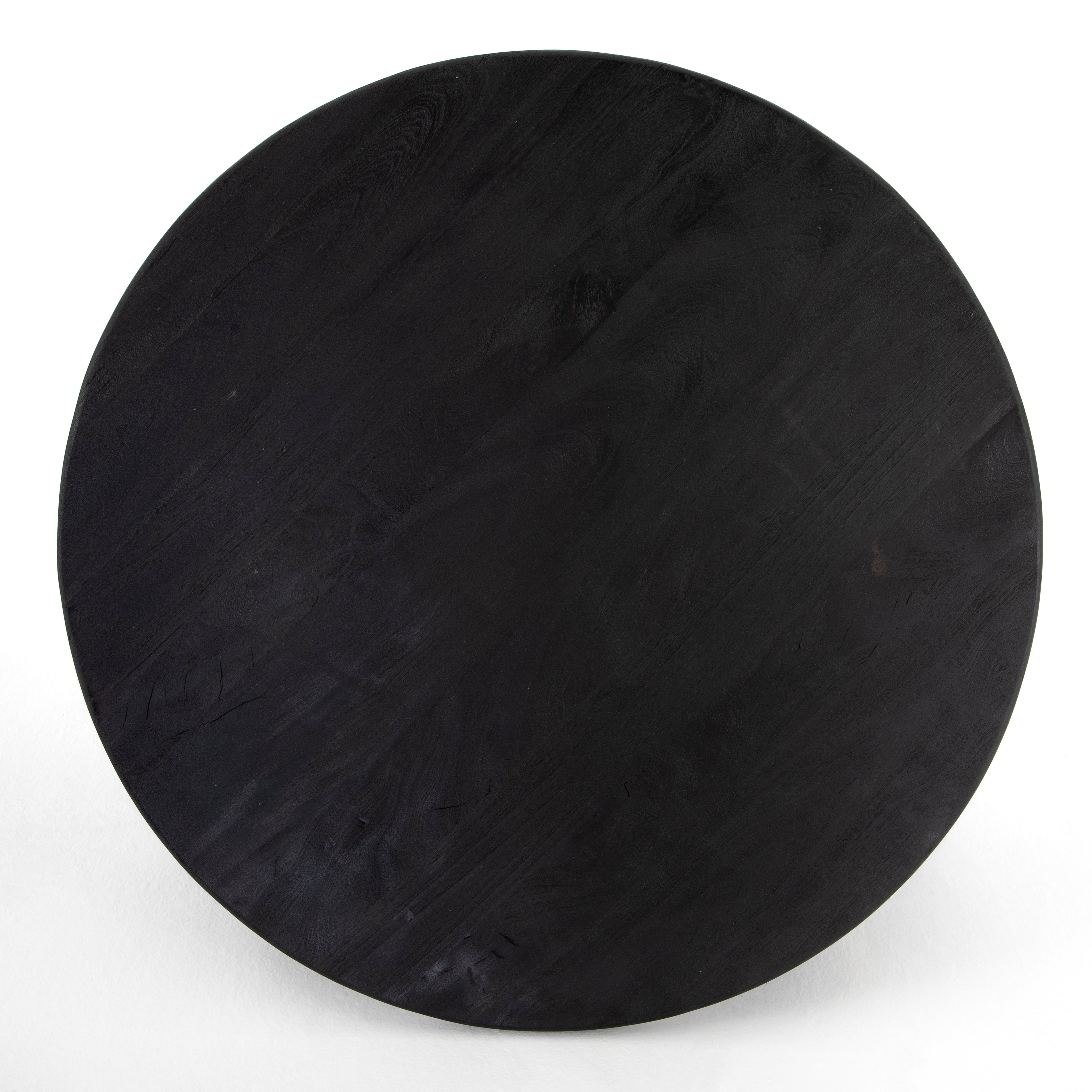 We love the shapely, substantial legs that support a slim, rounded tabletop of light black-finished reclaimed woods in this Maricopa Coffee Table - Dark Totem. A global, organic look with a handcrafted vibe.