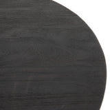We love the shapely, substantial legs that support a slim, rounded tabletop of light black-finished reclaimed woods in this Maricopa Coffee Table - Dark Totem. A global, organic look with a handcrafted vibe.