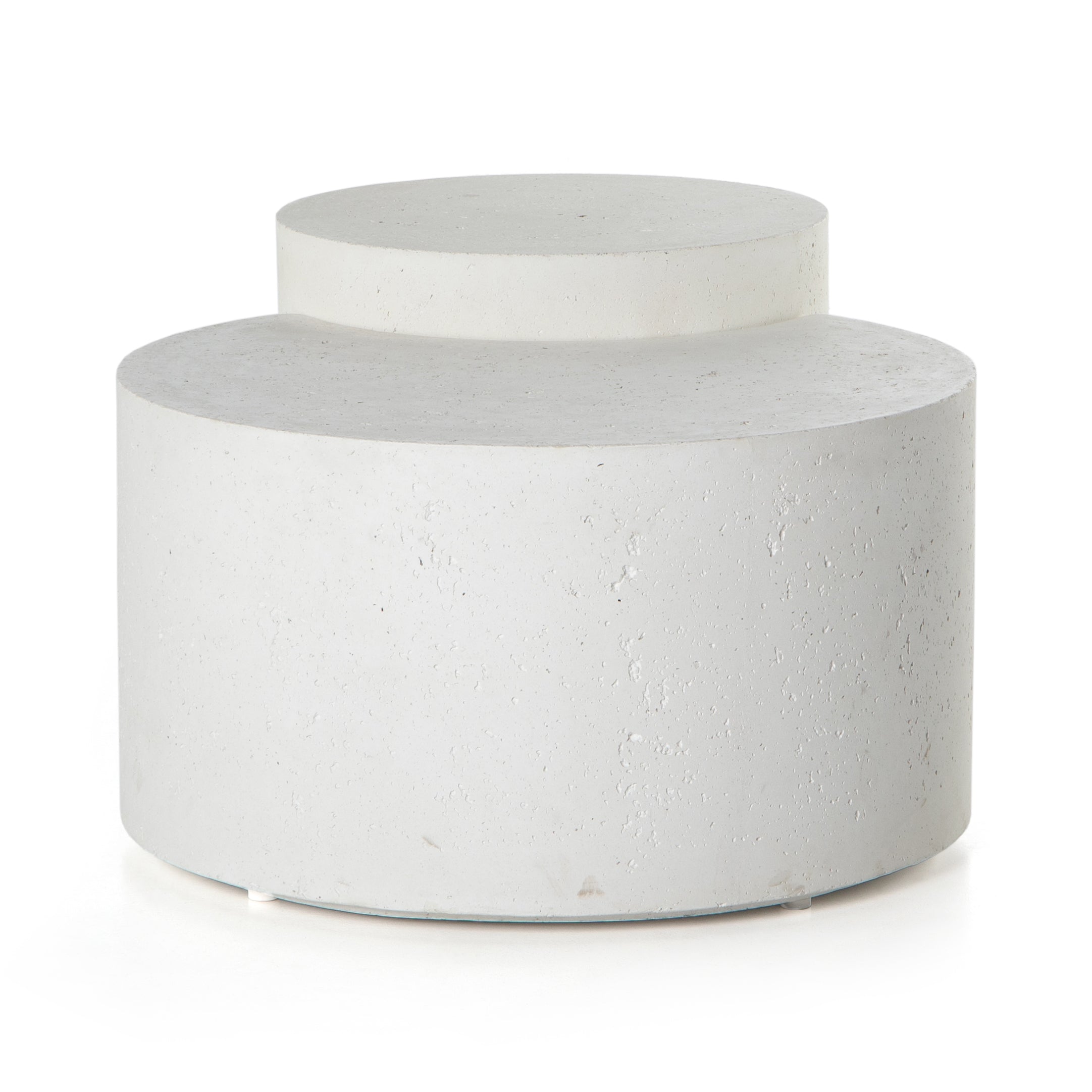 Made from white-finished concrete with deep, textured pitting, this Meza Nesting Coffee Table - Textured White is sturdy and beautiful. Inspired by mid-century coral décor, this nesting coffee table features two tiers for a layered look with modernity.  Overall Dimensions: 43.75"w x 28.25"d x 19.00"h
