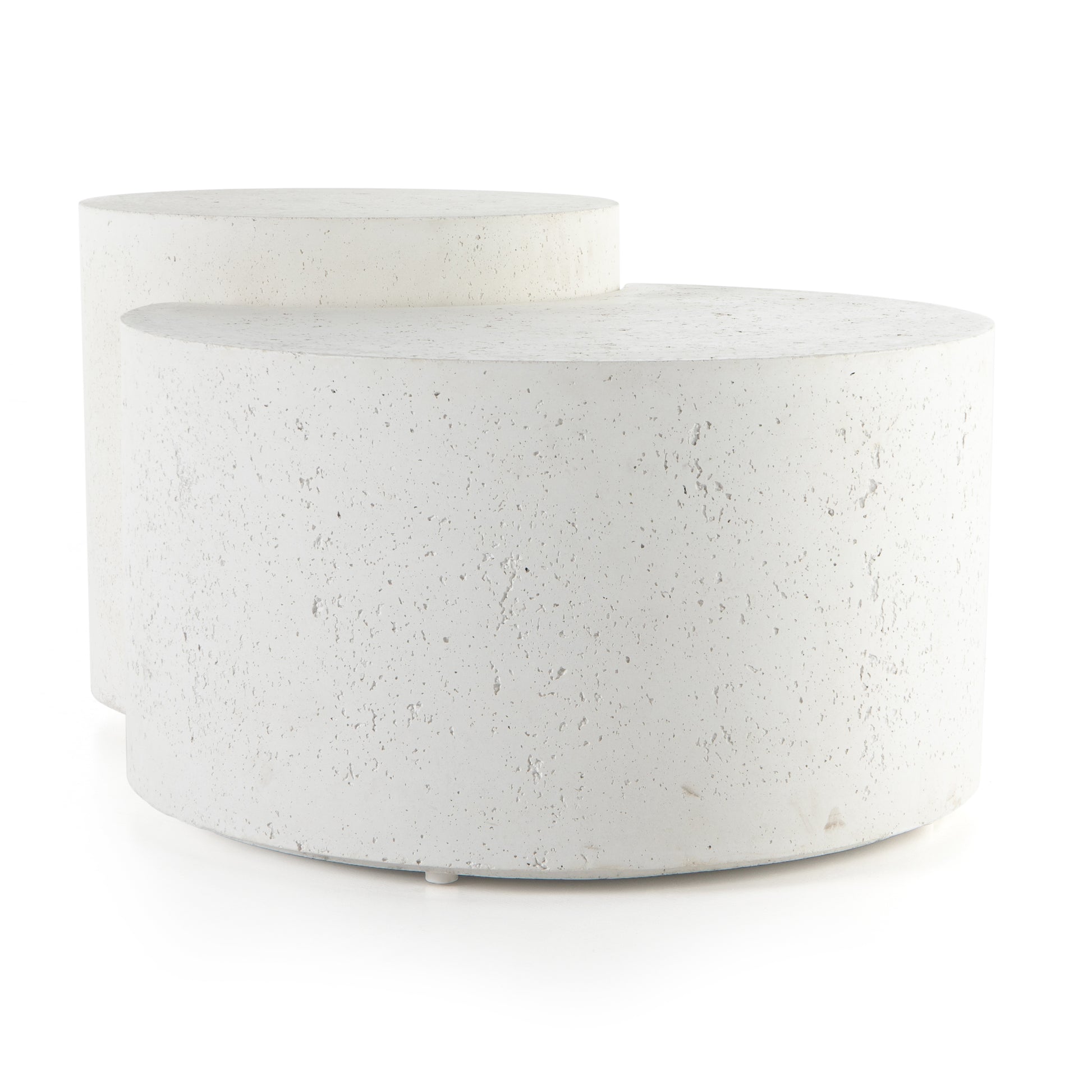 Made from white-finished concrete with deep, textured pitting, this Meza Nesting Coffee Table - Textured White is sturdy and beautiful. Inspired by mid-century coral décor, this nesting coffee table features two tiers for a layered look with modernity.  Overall Dimensions: 43.75"w x 28.25"d x 19.00"h