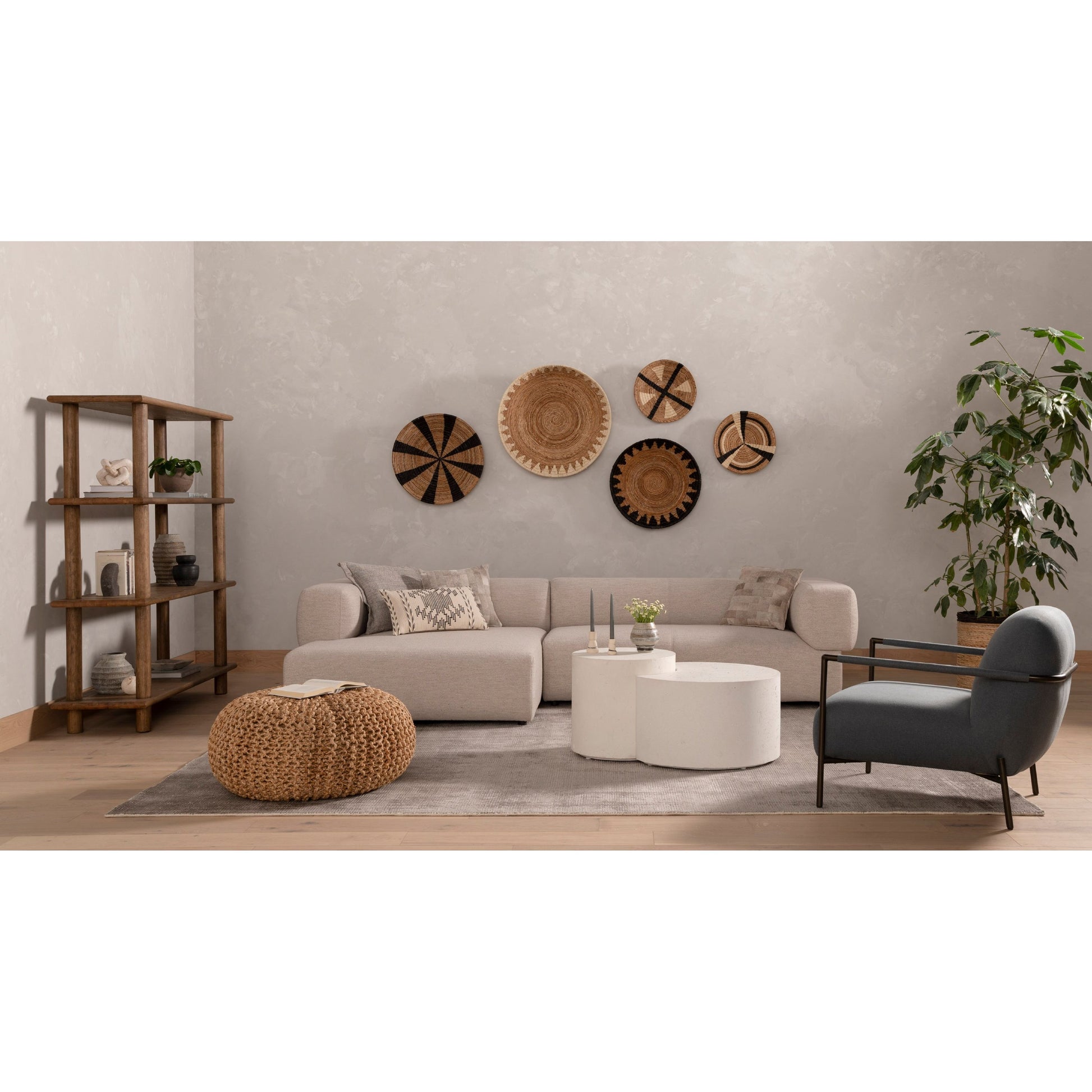 Made from white-finished concrete with deep, textured pitting, this Meza Nesting Coffee Table - Textured White is sturdy and beautiful. Inspired by mid-century coral décor, this nesting coffee table features two tiers for a layered look with modernity.  Overall Dimensions: 43.75"w x 28.25"d x 19.00"h