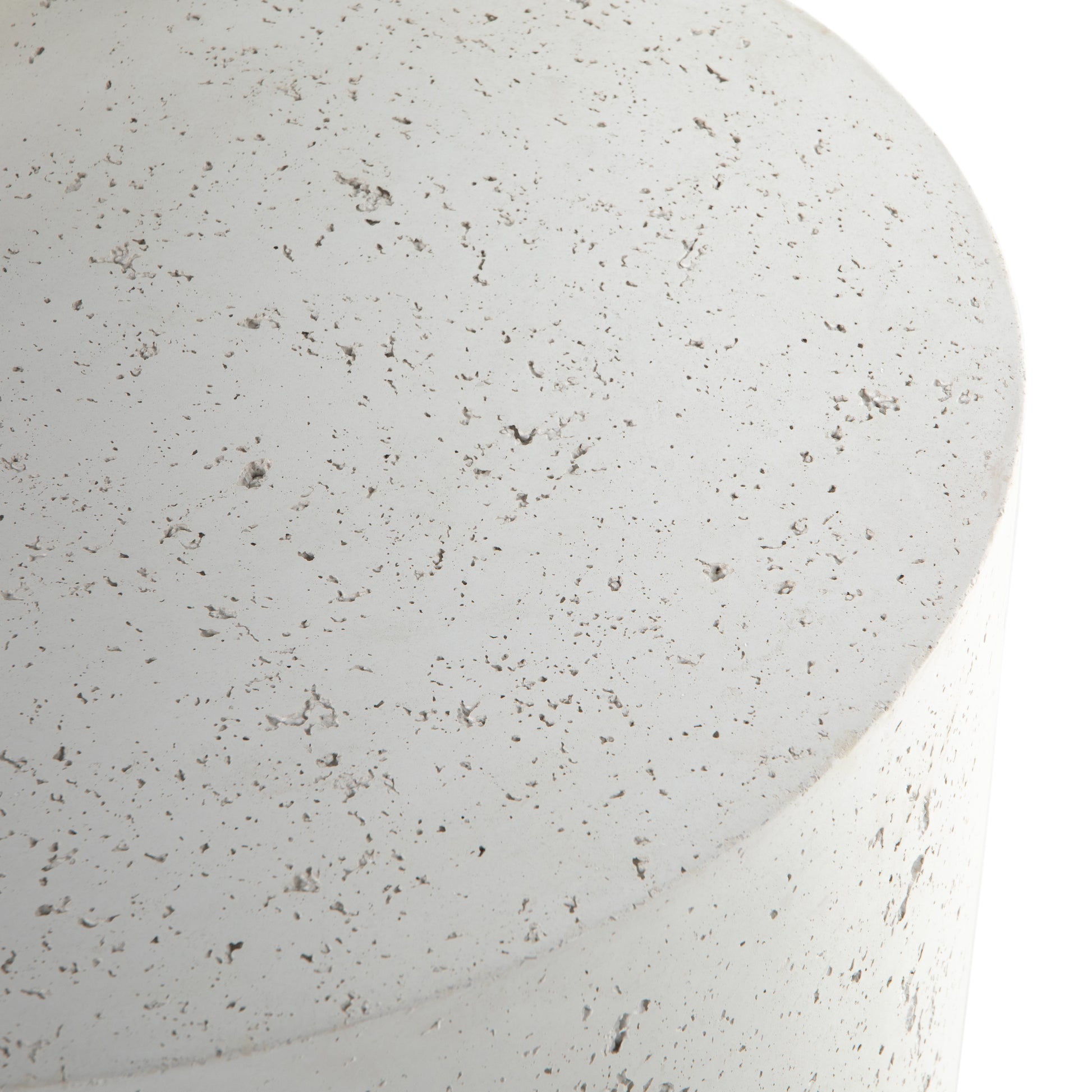 Made from white-finished concrete with deep, textured pitting, this Meza Nesting Coffee Table - Textured White is sturdy and beautiful. Inspired by mid-century coral décor, this nesting coffee table features two tiers for a layered look with modernity.  Overall Dimensions: 43.75"w x 28.25"d x 19.00"h
