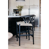 Featuring Muestra Counter + Bar Stool - Black Teak by Four Hands at Amethyst Home. Modern curves redefine the classic wishbone-style of this Muestra Black Teak Counter + Bar Stool. Vintage white all-weather wicker is woven for a dose of fresh texture within weathered grey teak framing. Cover or store indoors during inclement weather and when not in use.
.  Amethyst Home provides interior design, new home construction design consulting, vintage area rugs, and lighting in the Kansas City metro area.