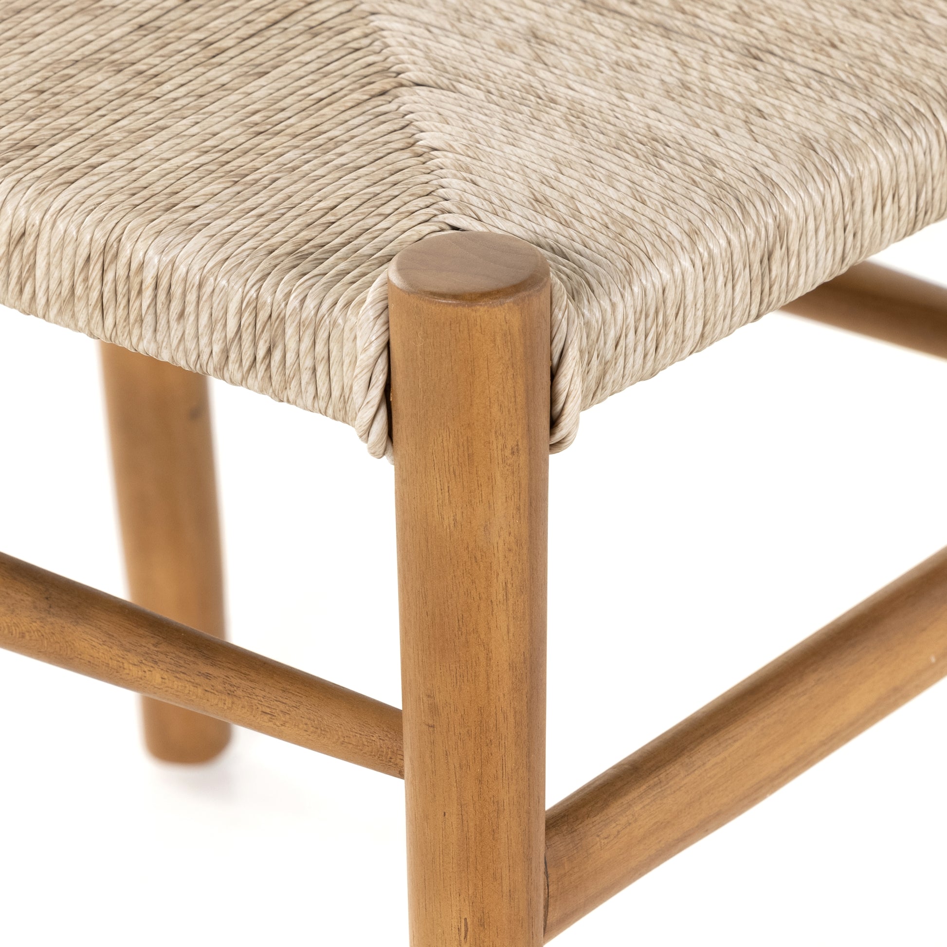 Modern curves redefine classic wishbone seating in this Muestra Dining Chair - Natural Teak. Vintage white all-weather wicker is woven for a dose of fresh texture against a neutral frame of natural teak. Cover or store indoors during inclement weather and when not in use.  Overall Dimensions: 21.50"w x 22.50"d x 31.50"h