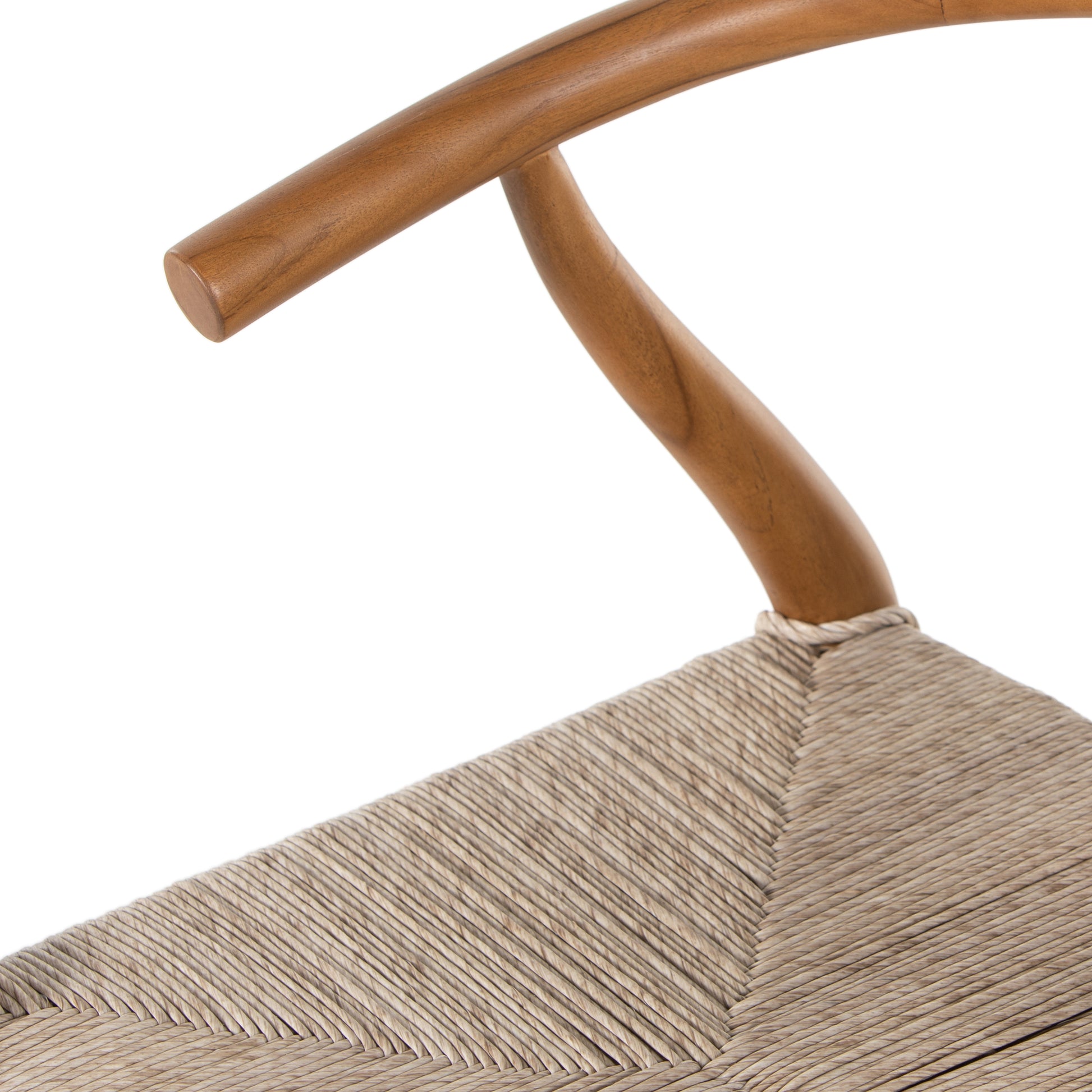 Modern curves redefine classic wishbone seating in this Muestra Dining Chair - Natural Teak. Vintage white all-weather wicker is woven for a dose of fresh texture against a neutral frame of natural teak. Cover or store indoors during inclement weather and when not in use.  Overall Dimensions: 21.50"w x 22.50"d x 31.50"h