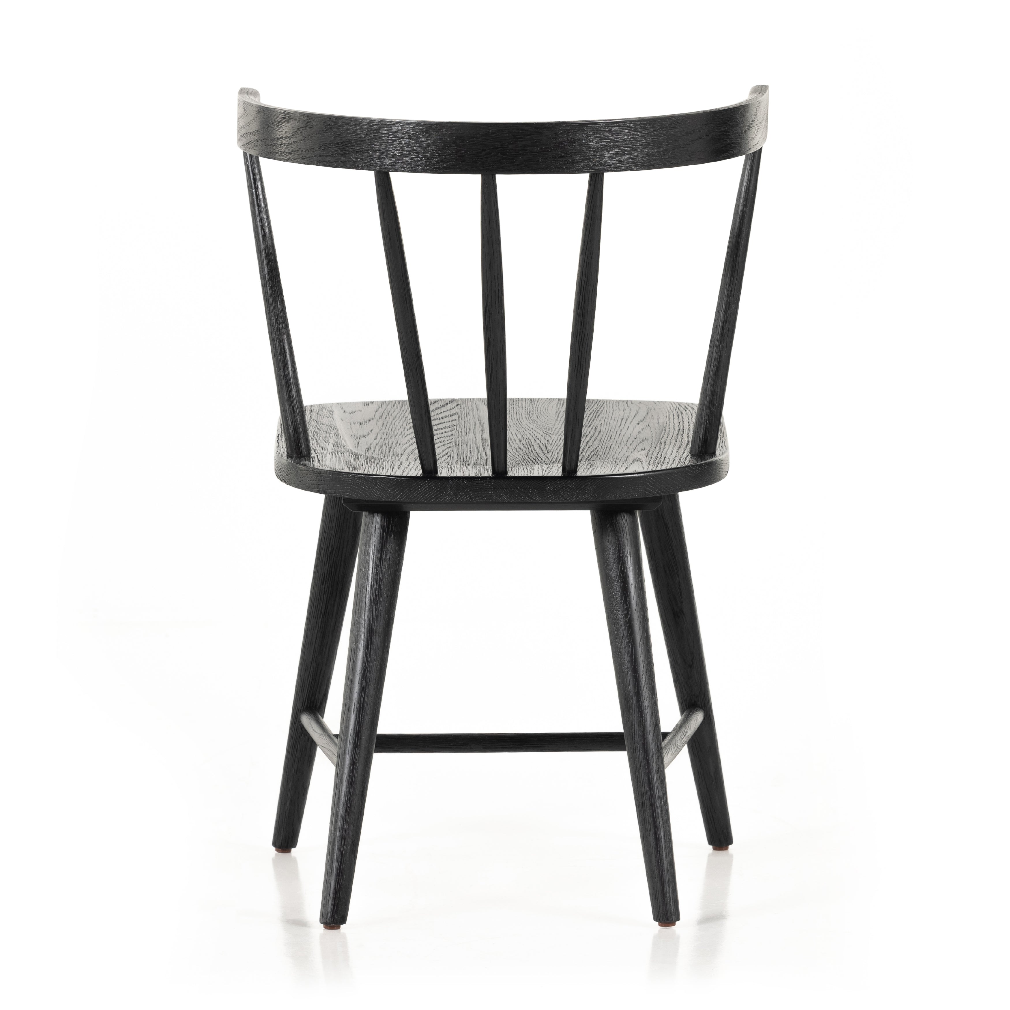 This Naples Dining Chair - Black Oak is a fresh twist on traditional Windsor-style seating is crafted from solid black-finished oak, for a look that’s always in style.  Overall Dimensions: 20.50"w x 21.50"d x 31.75"h