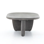 This Naya Outdoor Coffee Table is modern and curve-driven. Dark grey concrete forms a rounded rectangle top with bullnose edging, reminiscent of a shapely surfboard.  Cover or store inside during inclement weather.  Overall Dimensions: 46.00"w x 28.00"d x 16.00"h