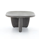 This Naya Outdoor Coffee Table is modern and curve-driven. Dark grey concrete forms a rounded rectangle top with bullnose edging, reminiscent of a shapely surfboard.  Cover or store inside during inclement weather.  Overall Dimensions: 46.00"w x 28.00"d x 16.00"h