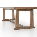 Bring a traditional sense to the table with this Otto Dining Table - 110". Finished in a warm honey hue, a trestle-style base of reclaimed pine supports a rectangular top of pine, waxed and bleached for a rustic look with natural depth.