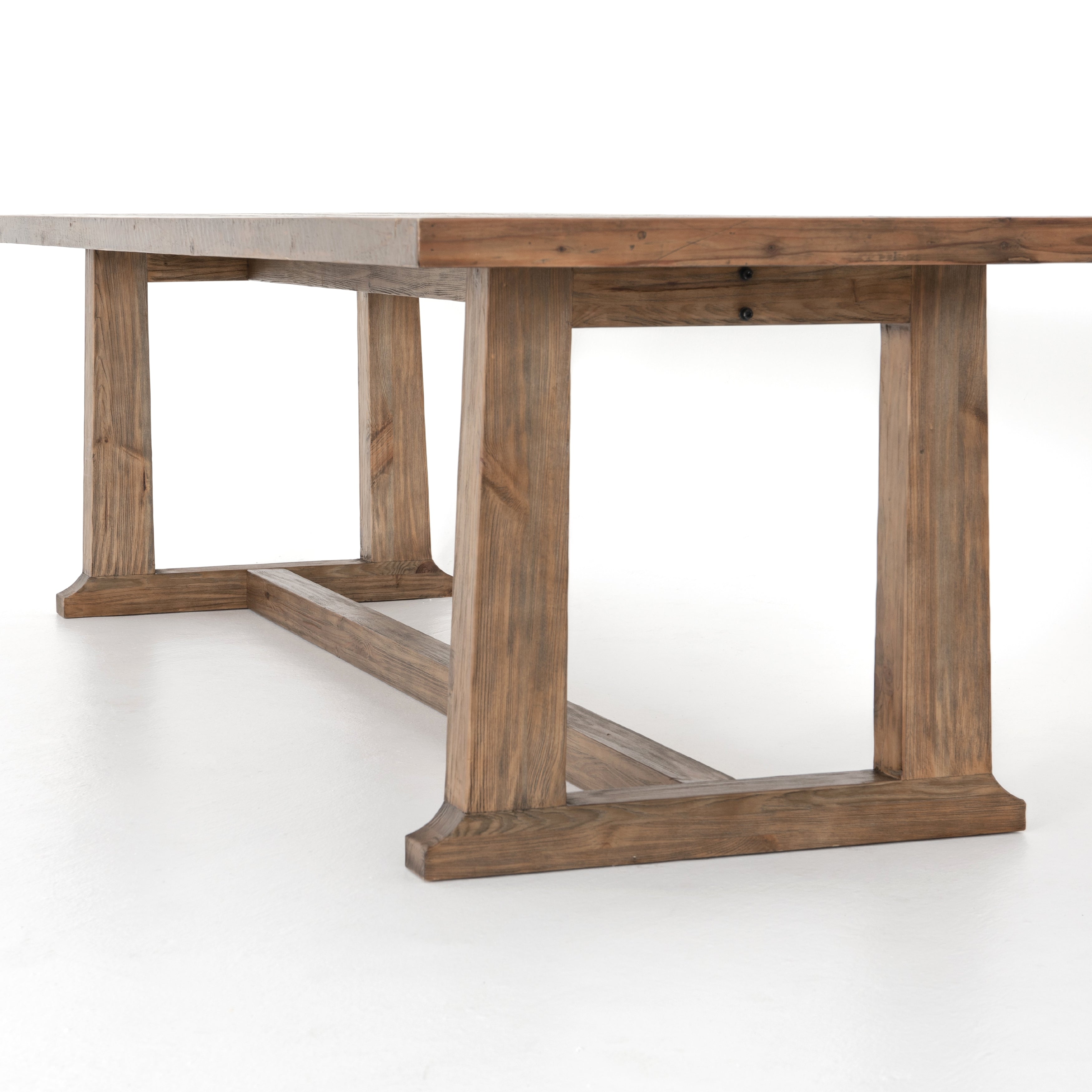 Featuring Otto Dining Table - 110" by Four Hands at Amethyst Home. Bring a traditional sense to the table with this Otto Dining Table - 110". Finished in a warm honey hue, a trestle-style base of reclaimed pine supports a rectangular top of pine, waxed and bleached for a rustic look with natural depth.
Amethyst Home celebrates natural materials, which ofte.  Amethyst Home provides interior design, new home construction design consulting, vintage area rugs, and lighting in the San Diego metro area.