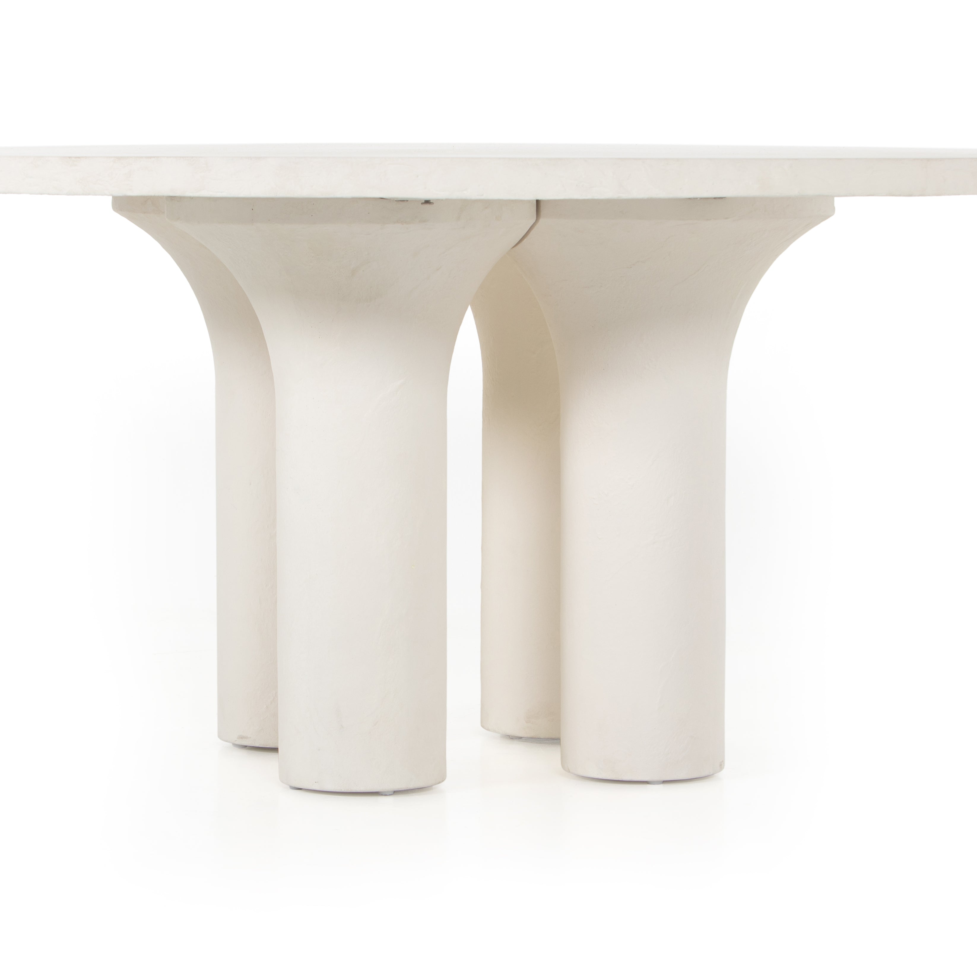 Featuring Parra Dining Table - Plaster Molded Concrete by Four Hands at Amethyst Home. This Parra Dining Table - Plaster Molded Concrete is made from plaster-molded concrete with a cylindrical pillar-style base tapering slightly to support a smooth, white-finished tabletop. We love the texture and brightness this brings to any dining room or kitchen area.   .  Amethyst Home provides interior design, new home construction design consulting, vintage area rugs, and lighting in the Houston metro area.