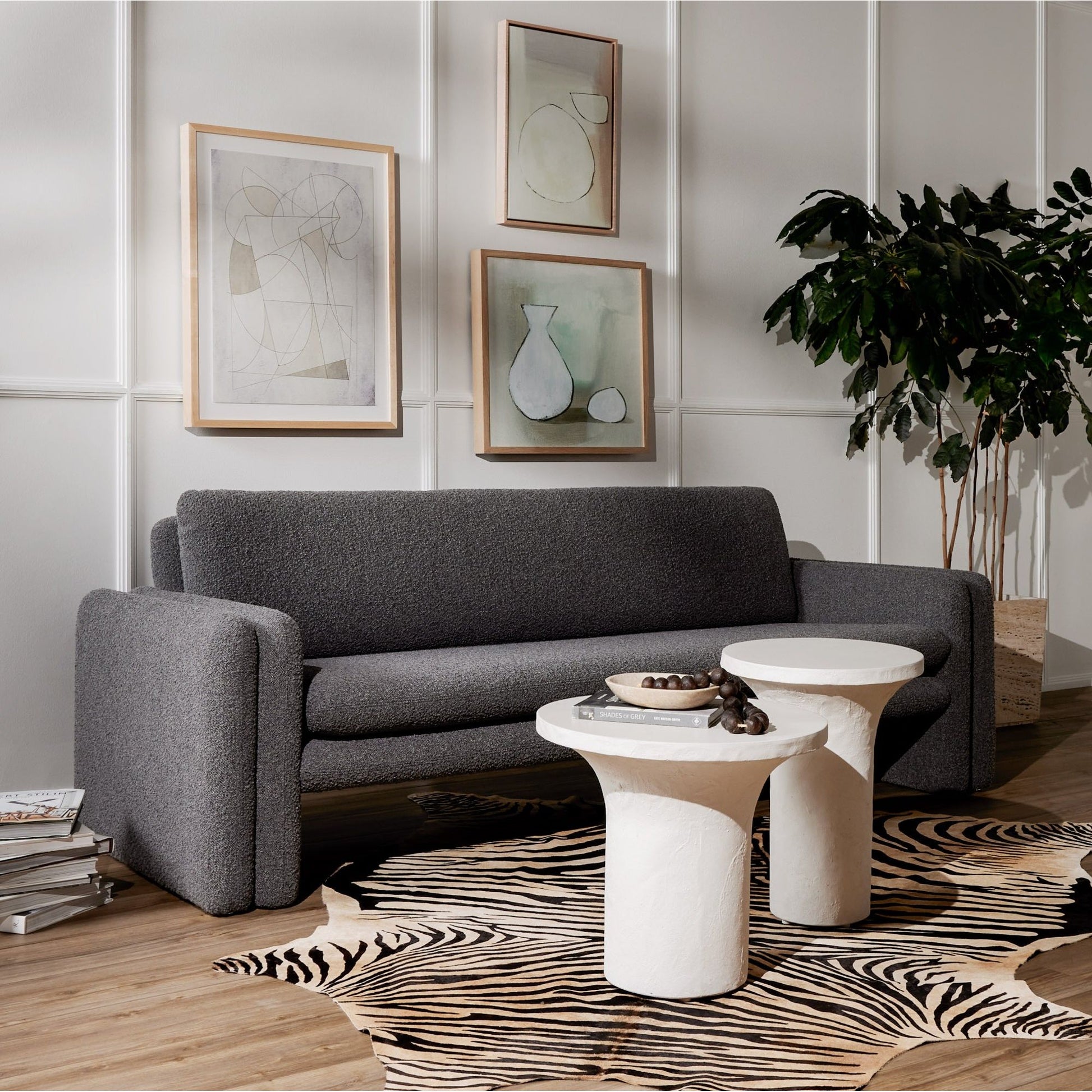 Made from plaster-molded concrete, a pedestal-style base supports a rounded tabletop of smooth, white-finished concrete in this Parra Low End Table - Plaster Molded Concrete. This brings a clean, adobe-inspired vibe to any living room or lounge area. Pair with the matching High End Table for a staggered look!   Overall Dimensions: 20.00"w x 20.00"d x 18.00"h