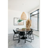 Classic tulip shaping is recast with a rustic black iron finish topped with a solid bluestone table top. This cute bistro style dining table is perfectly sized for a cozy breakfast nook.  Size: 55.00"w x 55.00"d x 29.50"h
