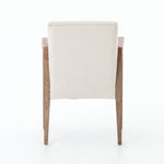 Elegance is no exaggeration with this Reuben Dining Chair - Harbor Natural. Slim, tapered oak with arms wrapped in vintage leather frames a floating seat covered in natural linen. We'd love to see this in your dining room, kitchen, or other space!  Overall Dimensions: 23.25"w x 25.50"d x 33.75"h