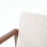 Elegance is no exaggeration with this Reuben Dining Chair - Harbor Natural. Slim, tapered oak with arms wrapped in vintage leather frames a floating seat covered in natural linen. We'd love to see this in your dining room, kitchen, or other space!  Overall Dimensions: 23.25"w x 25.50"d x 33.75"h