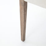 Elegance is no exaggeration with this Reuben Dining Chair - Harbor Natural. Slim, tapered oak with arms wrapped in vintage leather frames a floating seat covered in natural linen. We'd love to see this in your dining room, kitchen, or other space!  Overall Dimensions: 23.25"w x 25.50"d x 33.75"h