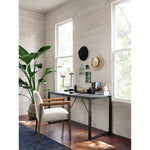 Elegance is no exaggeration with this Reuben Dining Chair - Harbor Natural. Slim, tapered oak with arms wrapped in vintage leather frames a floating seat covered in natural linen. We'd love to see this in your dining room, kitchen, or other space!  Overall Dimensions: 23.25"w x 25.50"d x 33.75"h