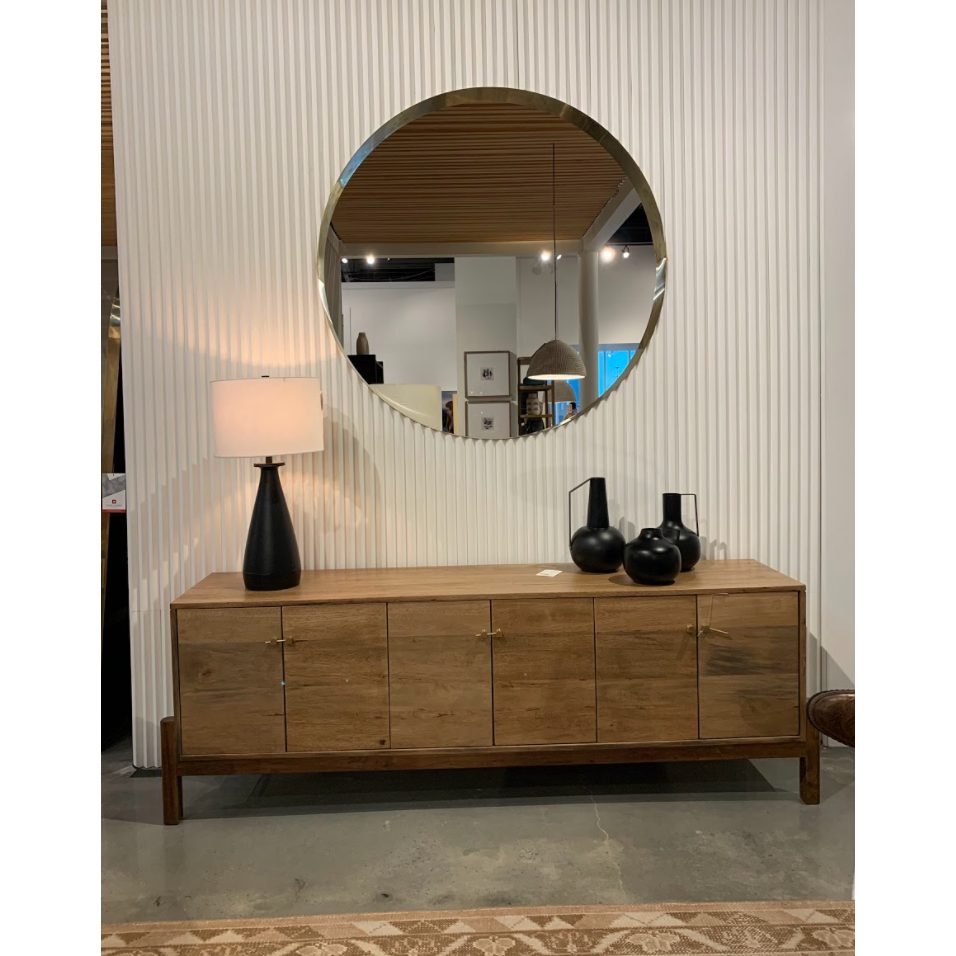 We love mid-century feel to this Reza Media Console - Smoked Honey. Finished in a light, smoked honey, a clean-lined parawood console sits in an arched cradle base of toasted acacia, for fresh contrast. Twist-lock metal hardware adds a clever finishing touch. Rear cutouts for media cord management. Amethyst Home provides interior design, new home construction design consulting, vintage area rugs, and lighting in the Des Moines metro area.