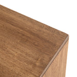We love mid-century feel to this Reza Media Console - Smoked Honey. Finished in a light, smoked honey, a clean-lined parawood console sits in an arched cradle base of toasted acacia, for fresh contrast. Twist-lock metal hardware adds a clever finishing touch. Rear cutouts for media cord management.  Overall Dimensions: 84.00"w x 18.00"d x 28.25"h
