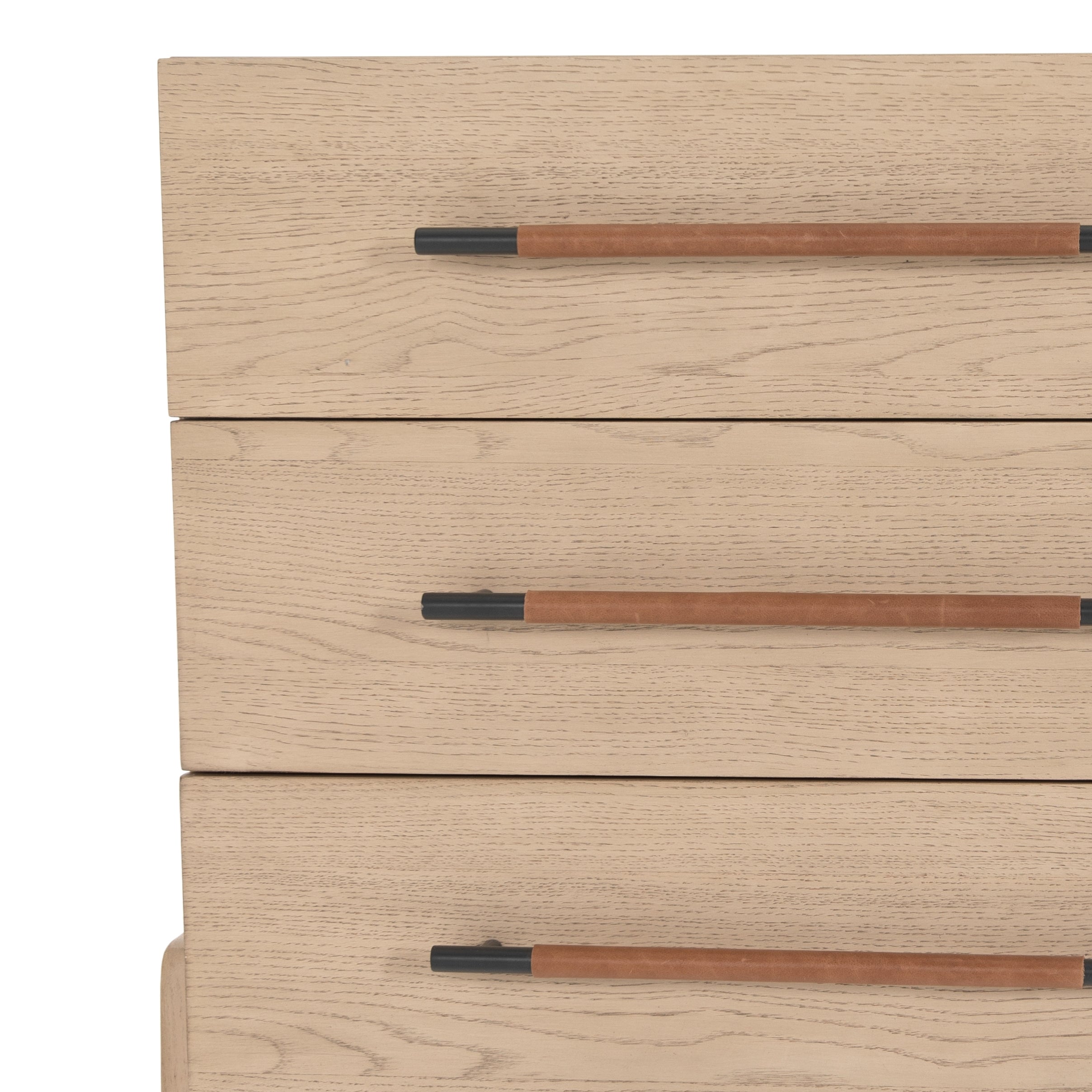 Featuring Rosedale 3 Drawer Dresser by Four Hands at Amethyst Home. The light-finished oak of this Rosedale 3 Drawer Dresser brings a clean, brightness to any room. We love how the three spacious drawers have iron hardware wrapped in a gorgeous, tan leather. The dimension legs with iron connecting them bring a unique look to your bedroom or other area!
Ove.  Amethyst Home provides interior design, new home construction design consulting, vintage area rugs, and lighting in the Charlotte metro area.