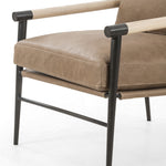 Featuring Rowen Chair - Palermo Drift by Four Hands at Amethyst Home. We love the slim, black steel frame of this Rowen Chair - Palermo Drift. Buttery, pronounced seating of tan top-grain leather with whitewashed ash accentuating angular arms make this an attractive seating choice for any living room, bedroom, or lounge area. 
Overall Dimensions: 27.50"W x .  Amethyst Home provides interior design, new home construction design consulting, vintage area rugs, and lighting in the Portland metro area.