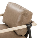 Featuring Rowen Chair - Palermo Drift by Four Hands at Amethyst Home. We love the slim, black steel frame of this Rowen Chair - Palermo Drift. Buttery, pronounced seating of tan top-grain leather with whitewashed ash accentuating angular arms make this an attractive seating choice for any living room, bedroom, or lounge area. 
Overall Dimensions: 27.50"W.  Amethyst Home provides interior design, new home construction design consulting, vintage area rugs, and lighting in the Kansas City metro area.