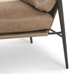 Featuring Rowen Chair - Palermo Drift by Four Hands at Amethyst Home. We love the slim, black steel frame of this Rowen Chair - Palermo Drift. Buttery, pronounced seating of tan top-grain leather with whitewashed ash accentuating angular arms make this an attractive seating choice for any living room, bedroom, or lounge area. 
Overall Dimensions: 27.50"W x 32".  Amethyst Home provides interior design, new home construction design consulting, vintage area rugs, and lighting in the Omaha metro area.
