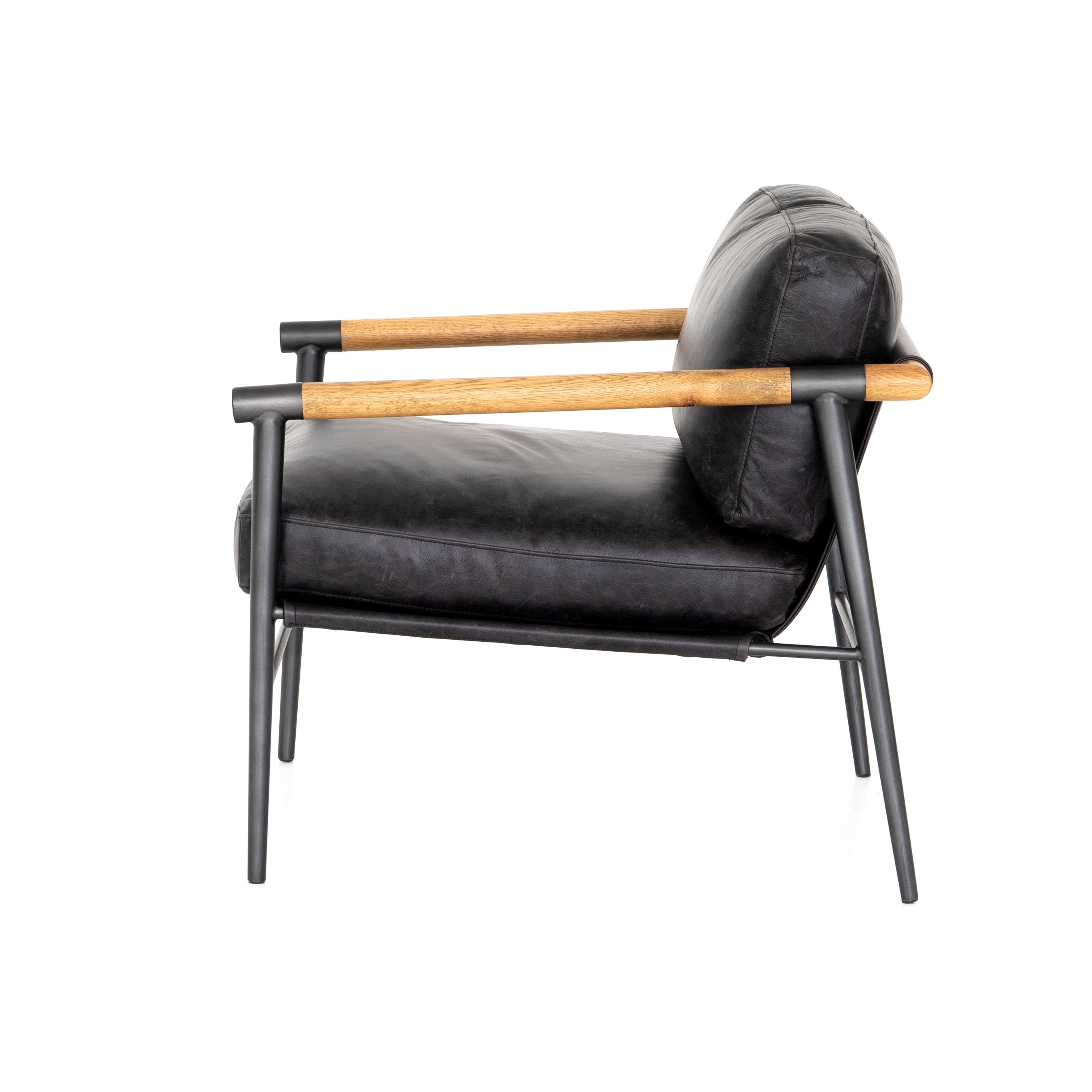 Featuring Rowen Chair - Sonoma Black by Four Hands at Amethyst Home. This Rowen Chair - Sonoma Black has buttery black seating of top-grain leather, with angular arms of exposed oak providing fresh contrast. A comfy, modern chair to add to any living room, bedroom, or other area. 
Overall Dimensions: 27.50"W x 32"L x 31"HColors: Toasted Oak, Sonoma Black, .  Amethyst Home provides interior design, new home construction design consulting, vintage area rugs, and lighting in the San Diego metro area.