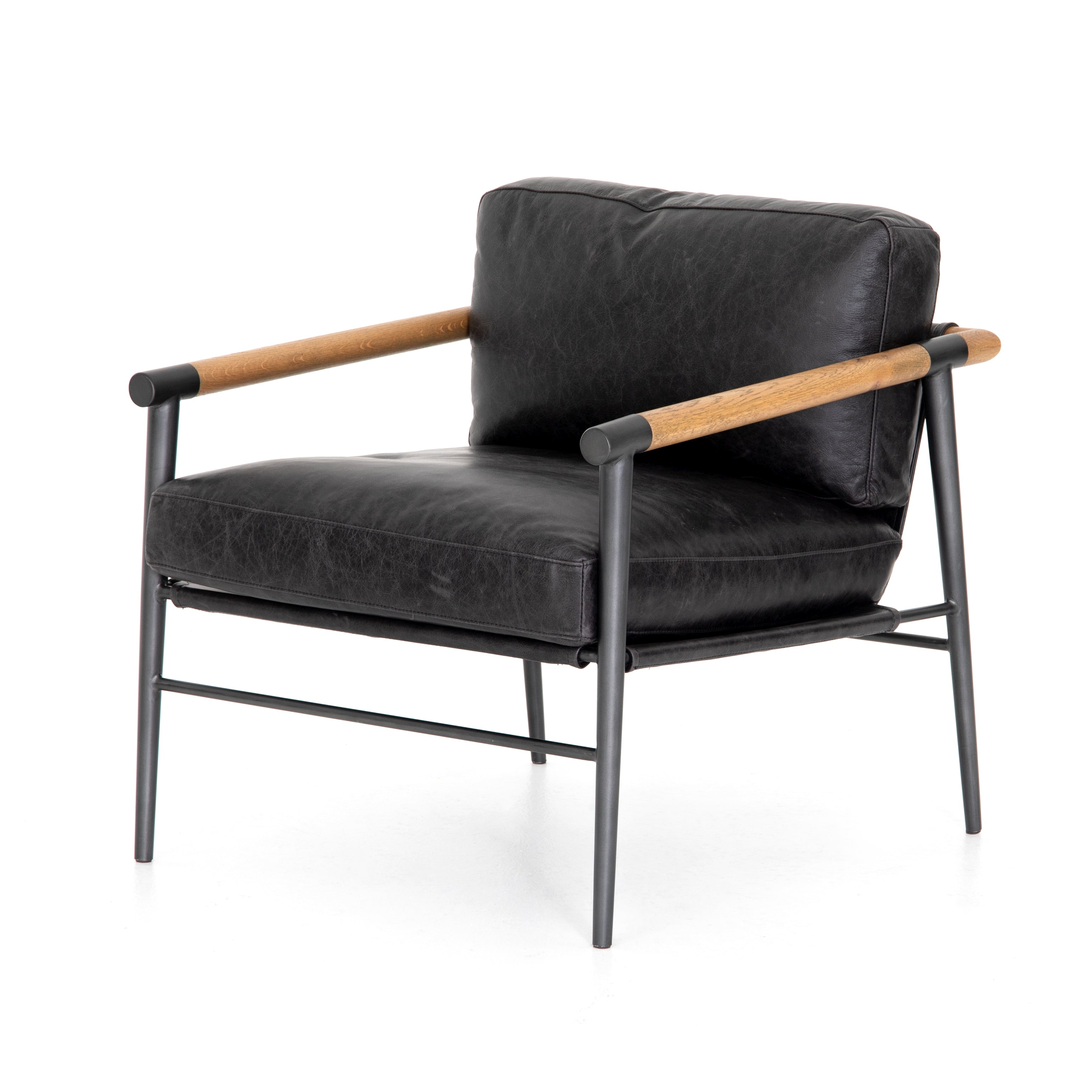 This Rowen Chair - Sonoma Black has buttery black seating of top-grain leather, with angular arms of exposed oak providing fresh contrast. A comfy, modern chair to add to any living room, bedroom, or other area.   Overall Dimensions: 27.50"w x 32.00"d x 31.00"h