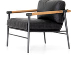 Featuring Rowen Chair - Sonoma Black by Four Hands at Amethyst Home. This Rowen Chair - Sonoma Black has buttery black seating of top-grain leather, with angular arms of exposed oak providing fresh contrast. A comfy, modern chair to add to any living room, bedroom, or other area. 
Overall Dimensions: 27.50"W x 32"L x 31"HColors: Toasted Oak, Sonoma Black, Car.  Amethyst Home provides interior design, new home construction design consulting, vintage area rugs, and lighting in the Boston metro area.