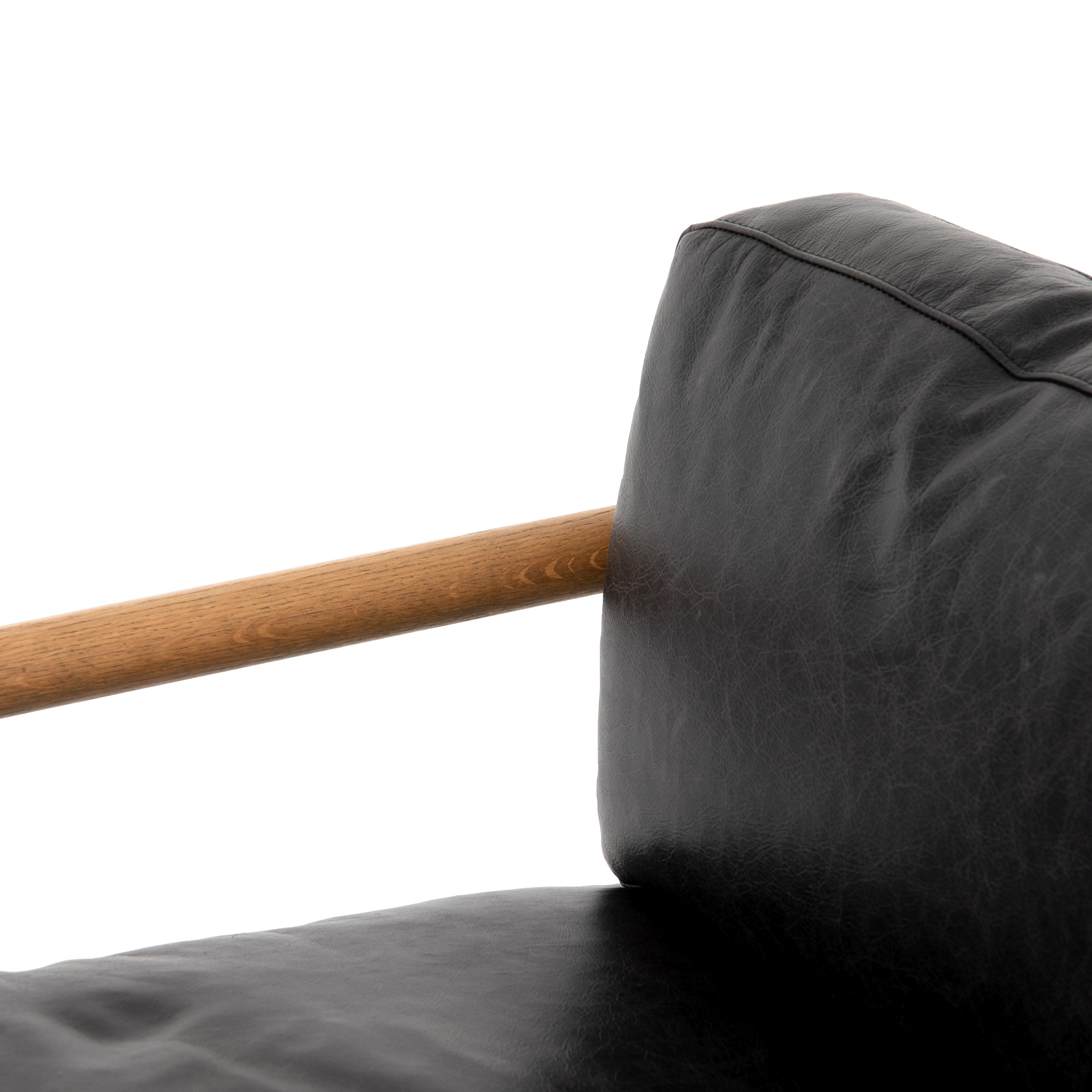 Featuring Rowen Chair - Sonoma Black by Four Hands at Amethyst Home. This Rowen Chair - Sonoma Black has buttery black seating of top-grain leather, with angular arms of exposed oak providing fresh contrast. A comfy, modern chair to add to any living room, bedroom, or other area. 
Overall Dimensions: 27.50"W x 32"L x 31"HColors: Toasted Oak, Sonoma Black, .  Amethyst Home provides interior design, new home construction design consulting, vintage area rugs, and lighting in the Nashville metro area.