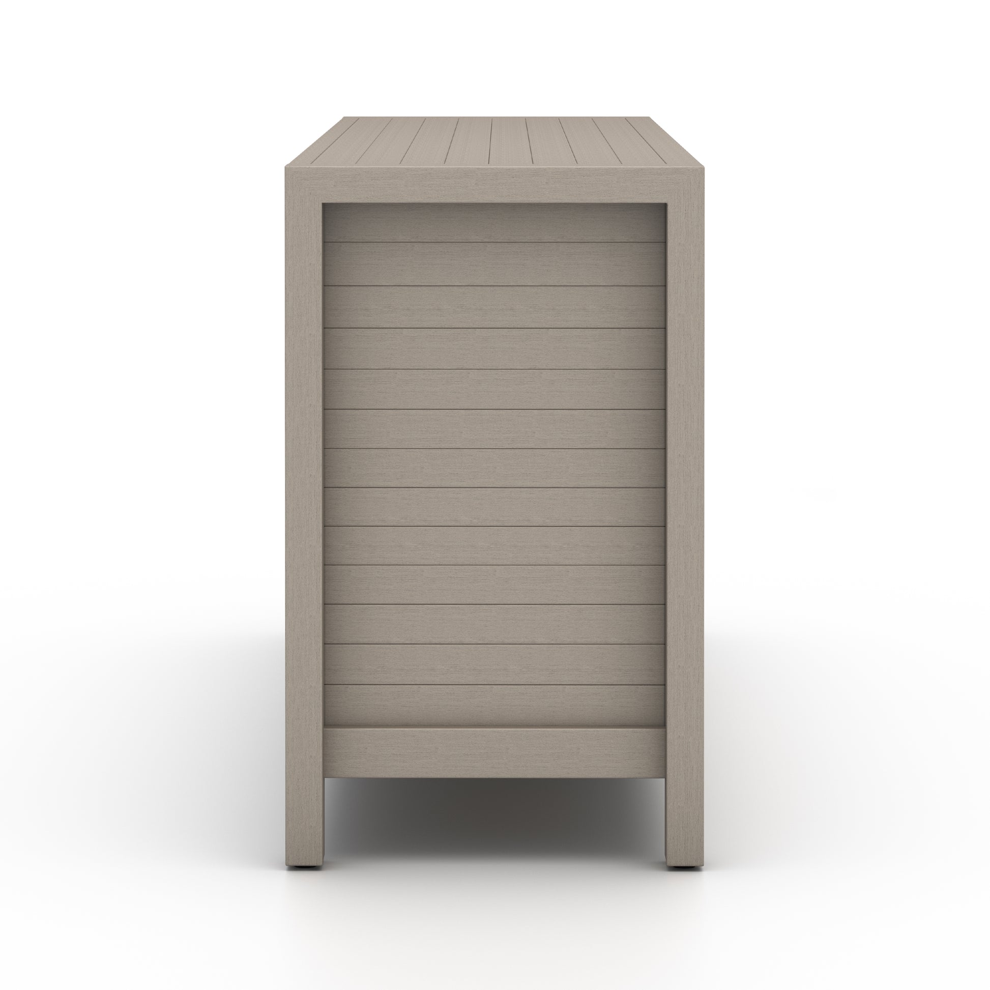 Take outdoor storage to the next level with this Sonoma Outdoor Sideboard - Weathered Grey. Finished in a weathered grey, solid FSC-certified teak forms a modern-minded sideboard, with slatted fronts for a light, linear look. Cover or store indoors during inclement weather and when not in use.  Overall Dimensions: 70.00"w x 18.00"d x 30.00"h