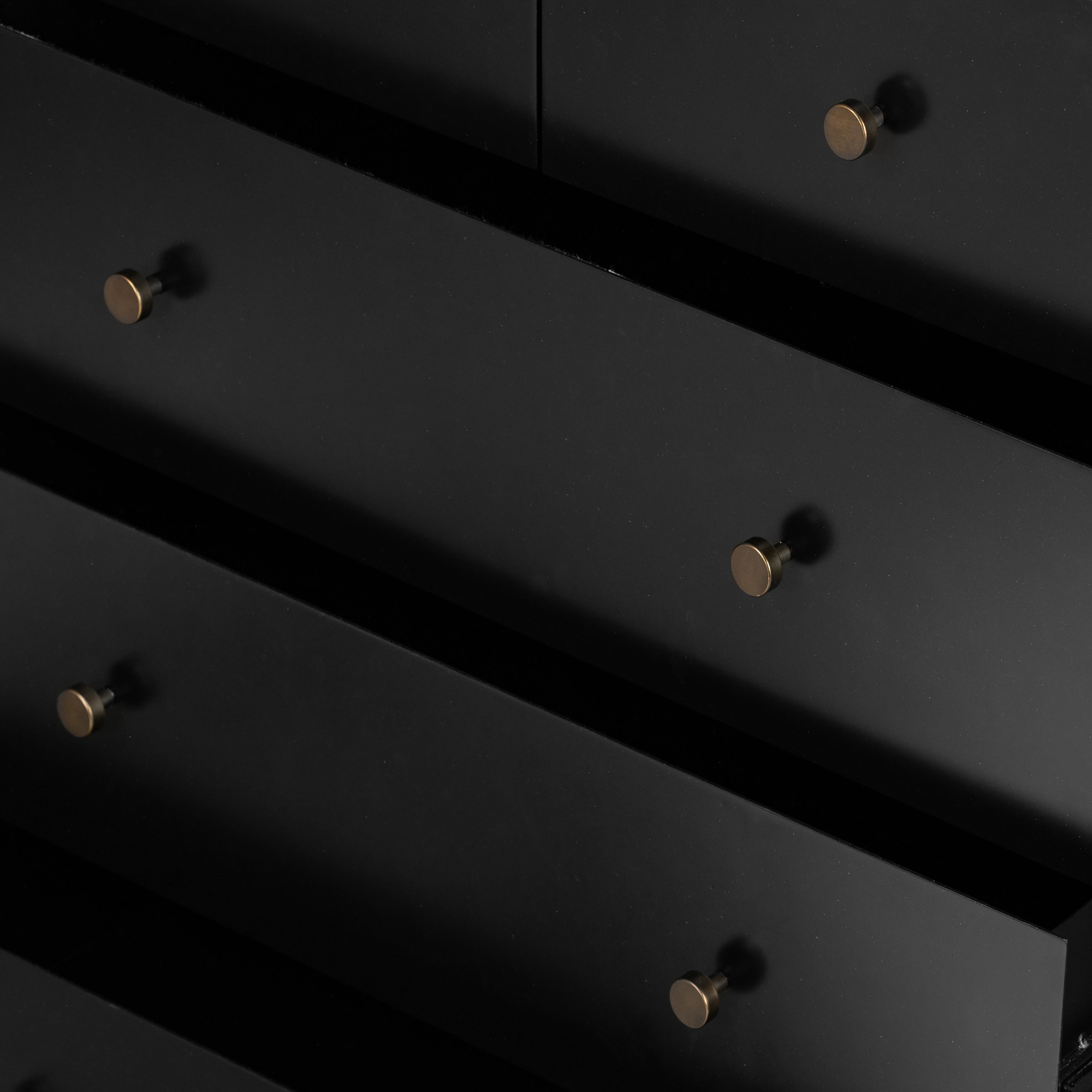 Bring a clean, beautifully industrial look to the bedroom with this Soto 5 Drawer Dresser - Black!  The roomy five-drawer dresser is made from black-finished iron, featuring bronzed iron hardware to elevate the look of any bedroom!  Overall Dimensions: 36.00"w x 19.00"d x 38.50"h